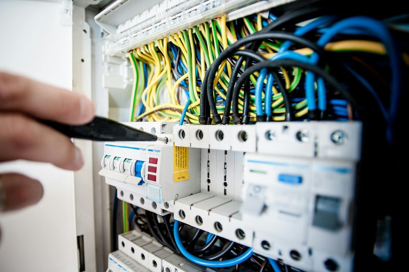 Electrician on the job while Callspace handles incoming calls
