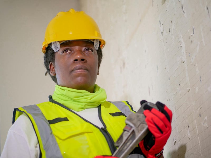 Plumber on the job while Callspace handles incoming calls